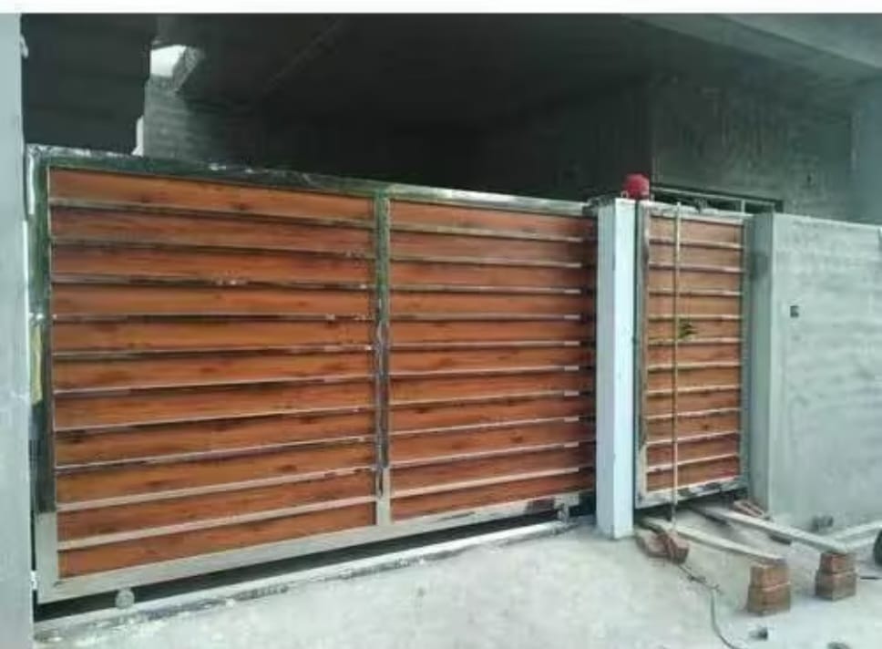 Wooden panel steel gate installation