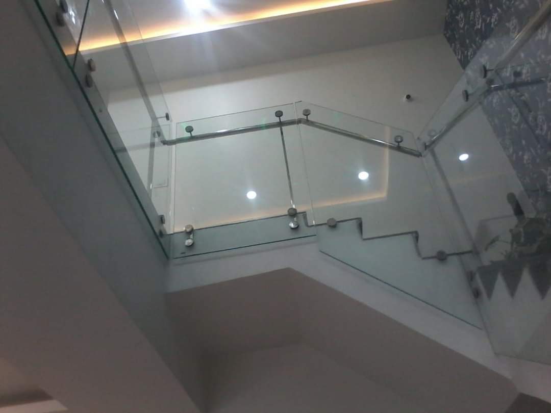 Interior glass staircase railing