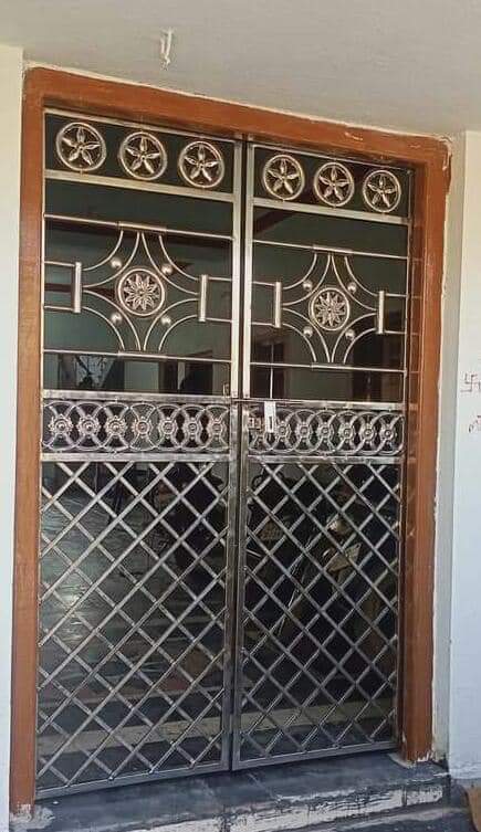 Ornate decorative steel grill door